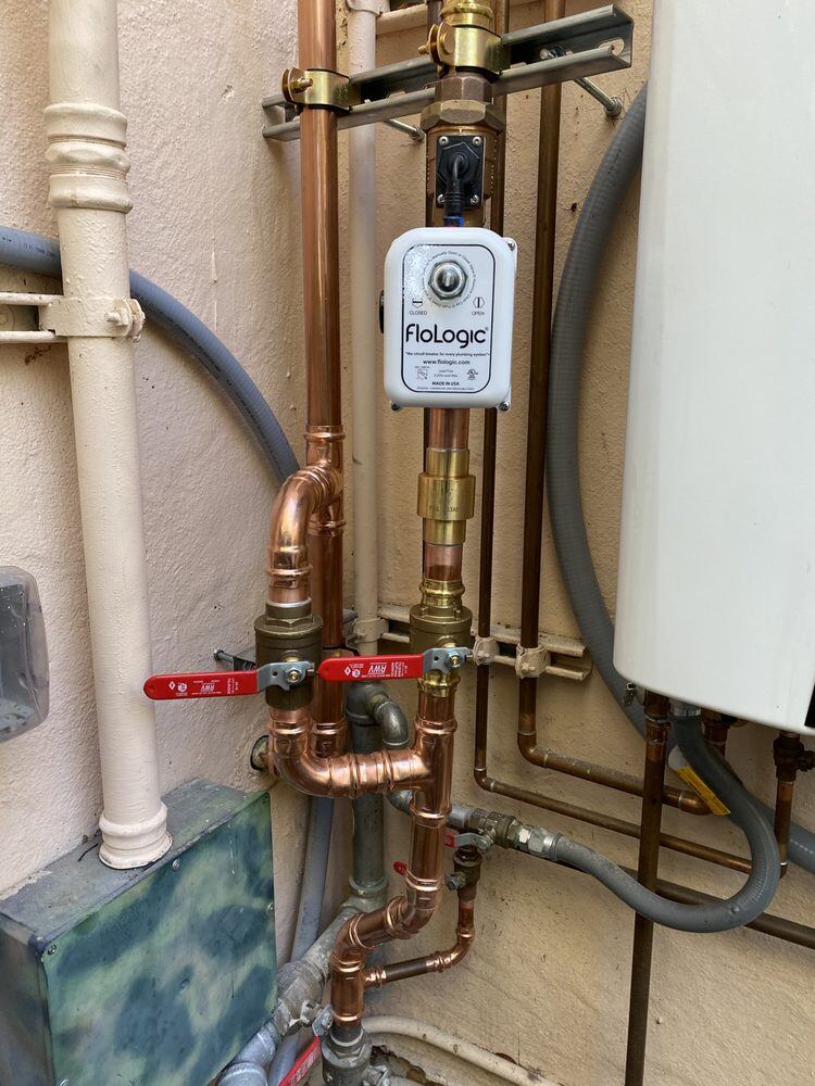 Isolation valves at a main supply connection