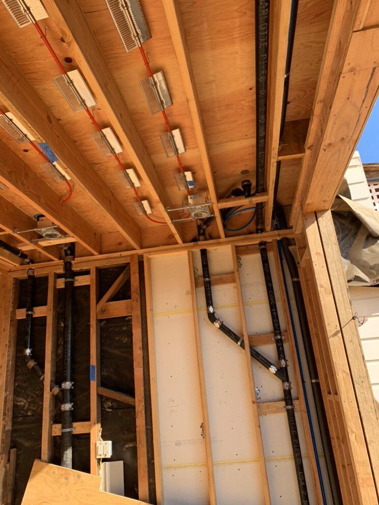 Supply lines routed overhead during a repipe