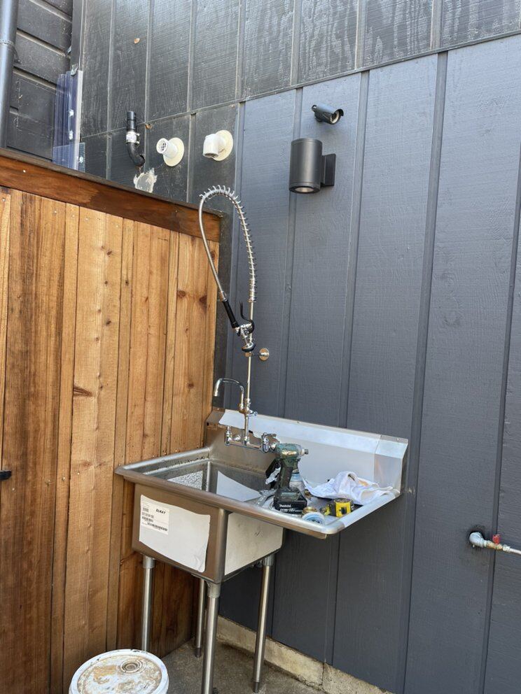 Commercial sink drain and supply connections